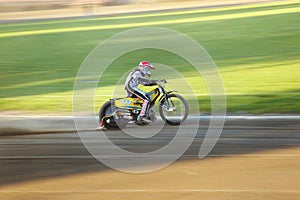 Speedway rider on the track